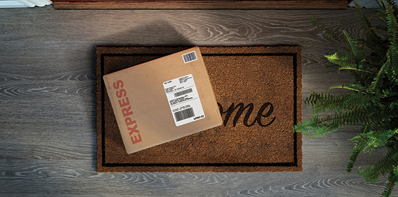 an express same day delivery parcel on a doormat